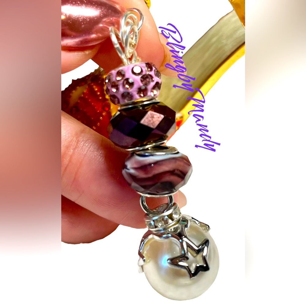 Purple and silver with silver star themed glass pearl wrapped pendant